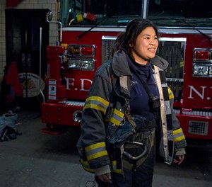 New York City firefighter Sarinya Srisakul speaks about her work in the FDNY Tuesday, Jan. 28, 2014, at a Manhattan fire house. Srisakul, who didn’t work with another woman for five years.