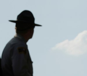 The case of a North Carolina State Trooper’s missing hat has wound its way up and down the state’s courts. (AP Photo/Charlie Riedel)