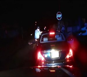 A frame grab from an officer's dashboard camera taken Dec. 30, 2014, and provided by the Bridgeton, N..J. Police Department. A divided New Jersey Supreme Court ruled Monday that police videos of an arrest that led to criminal charges against an officer can be shielded from disclosure under public records laws. (AP Photo/Bridgeton Police Department)
