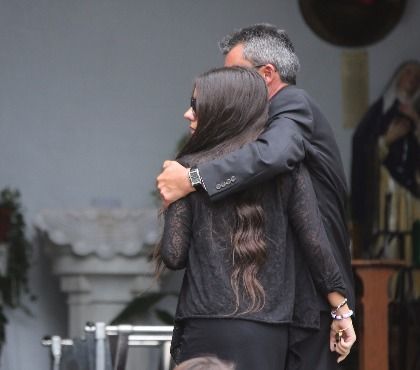 Andrea Rebello's sister Jessica and father Fernando arrive at St. Teresa of Avila Church for Andrea's funeral service, Wednesday, May 22, 2013.