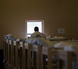 Inmates will often tell correctional healthcare personnel that sleeping on a thin mattress aggravates their chronic back pain. (AP Photo/Brynn Anderson)