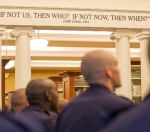 In this Oct. 1, 2015, photo, police recruits in Nashville, Tenn., participate in a program at the downtown library on the history of civil rights in the city.