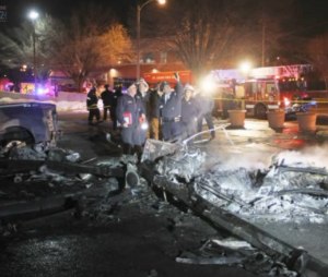 St. Louis Fire Department photo of crash scene and investigation. Pilot killed in crash, just before landing at the hospital.
