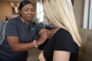 Acadian employees treat patients in their homes.