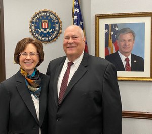 Alicia Wadas, left, received FBI recognition for Exceptional Service in the Public Interest.