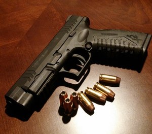 The legislation would require personnel to complete an eight-hour firearm training course and receive written permission from their supervisor before they would be allowed to carry on the job.
