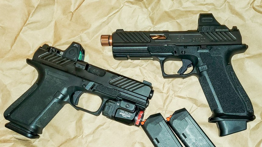 MR920 (left) with a Streamlight TLR-7 and Trijicon RMR attached; DR920 (right) has a Holosun 508T.