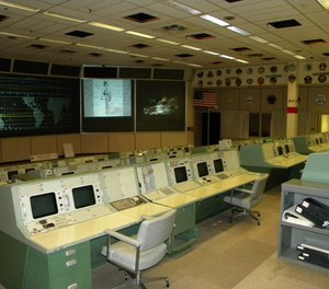The historic Apollo Mission Control Center in Houston, Texas. A recent restoration returned the control center to how it looked the day Apollo 11 landed on the moon on July 20, 1969. Current space station flights are controlled from an updated control center in the same building.