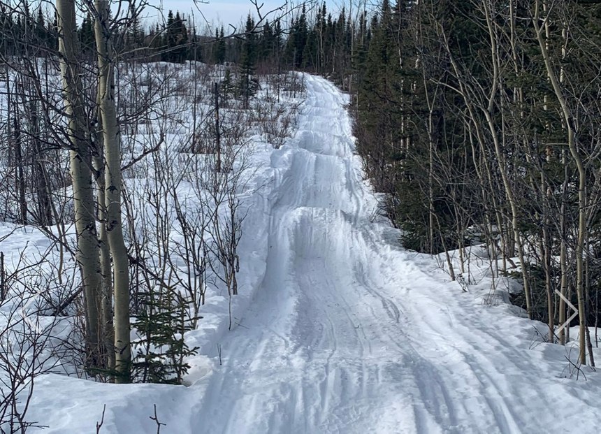 One- to five-foot moguls covered approximately 80 miles of the trail to McGrath, making it difficult for all modes of travel.