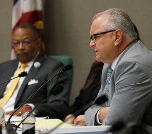 Assemblyman Tom Lackey, R-Palmdale, right, a former law enforcement officer, said he would not support a measure to restrict the use of deadly force by police, during a hearing of the Assembly Public Safety Committee, Tuesday, April 9, 2019, in Sacramento, Calif. (AP Photo/Rich Pedroncelli)