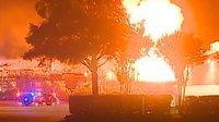 Video: Texas firefighters face explosions during paint plant fire