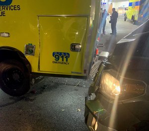 One Austin Travis County EMS medic was preparing to exit the ambulance through the back doors when the vehicle was struck.