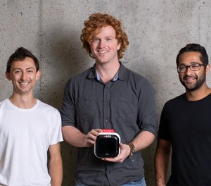 From left: Beyer, Andrews and Jafri with their Avive Connect portable AED