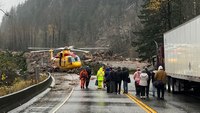Rescuers work to reach hundreds trapped overnight on British Columbia highway