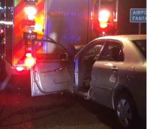 A photo of the accident scene involving a fire apparatus and vehicle in May 2016.