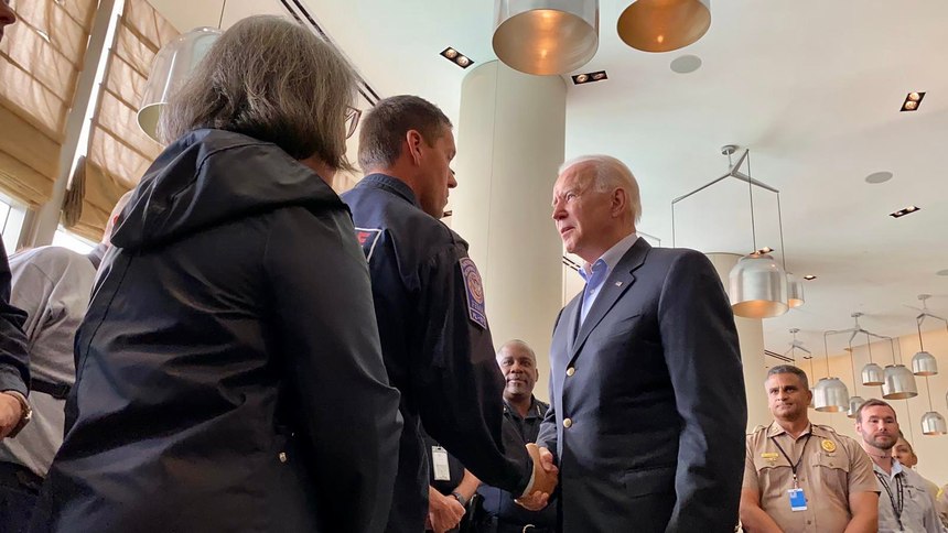 President Biden meets with first responders working the site of the Surfside condo collapose.
