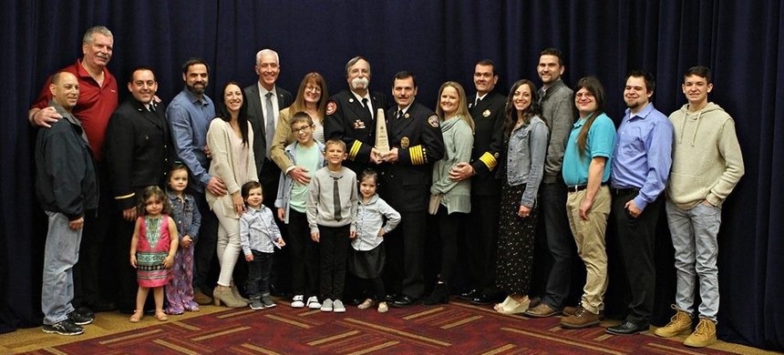 Chief Halton with Chief Goldfeder's family.