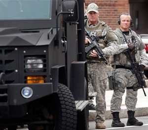 Armored vehicles and other so-called “militarized” looking equipment is essential to missions such as responding to violent crimes in progress like armed robberies and active-shooter incidents, barricaded subjects, hostage situations, as well as for searching for suspects like Dzhokhar and Tamerlan Tsarnaev, which is exactly what the officers pictured above were doing when this image was taken. (AP Photo)