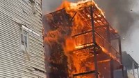 Video: Boston 4-alarm fire rips through 3 homes