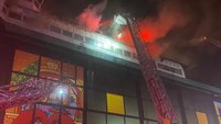 Fire burns historic Boston racetrack building as firefighters struggle to get water