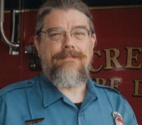 Brad Elder, 54, serves with the Crete Volunteer Fire Department and is a professor of biology at Doane University. Elder was one of the hundreds of first responders dispatched to a grass fire on Oct. 23.