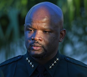 Gregory Tony, Sheriff of Broward County attends a memorial service at Pine Trails Park for the victims of the mass shooting at Marjory Stoneman Douglas High School