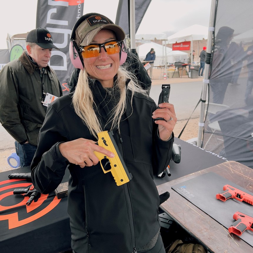 Holly Schirard is pictured with the Byrna SD, which fires .68 caliber projectiles in kinetic, inert and irritant configurations. The CO2 cartridge is pierced on the first trigger pull, making this an outstanding personal defense and LE tool.