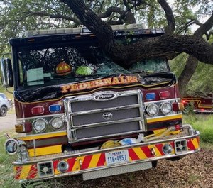 A Pedernales Fire Department engine crashed into a tree Saturday after its operator lost consciousness. (Photo/Pedernales Fire Department)