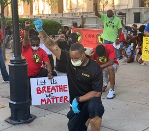 Cincinnati Firefighter William West III, the president of the Cincinnati African American Firefighters’ Association (CAFA), led a recent event that included a peaceful march by firefighters, their families and the public from the Cincinnati City Hall to the steps of the Hamilton County Courthouse. (Photo/CAFA)