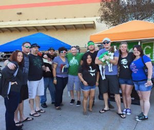 Code Green's mascot Annie the goat poses with members of the Chive Nation groups in attendance.
