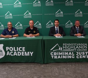 Officials signed the partnership agreement at Pennsylvania Highlands Community College.