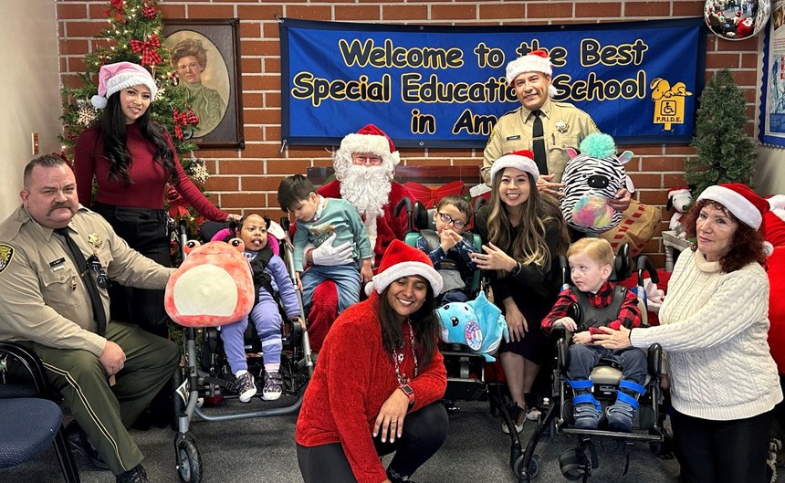 California Rehabilitation Center staff volunteered to make sure Victress Bower School students got a visit and gift from Santa.