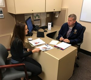 The author, James G. Barrett, Ph.D., is pictured with one of the social workers, Elana Klein, who is embedded in the program.