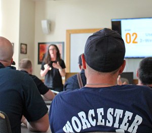 Worcester firefighters hear a 15-40 Connection presentation.