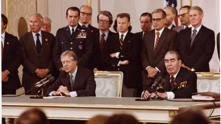 President Carter and Soviet General Secretary Leonid Brezhnev sign the Strategic Arms Limitation Talks (SALT II) treaty in Washington, D.C., on June 16, 1979.