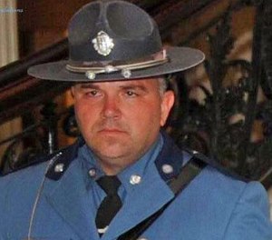 Thousands of police officers from across the state and nation stood at attention outside St. Michael church in Hudson during the service for Trooper Thomas Clardy. (MSP Image)
