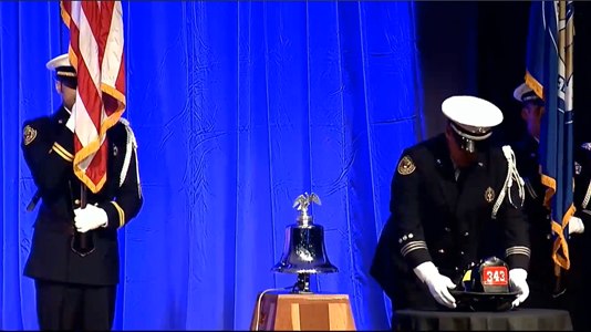 The helmet reads "343" to signify the number of FDNY firefighters who died in the line of duty on 9/11.