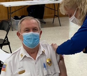 Chuck Kearns, CEO, Chatham Emergency Services, shown here in December, 2020 says about have of the department's employees were vaccinated as of July, 2021.