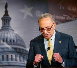 Senate Majority Leader Chuck Schumer of N.Y. speaks during a news conference on Capitol Hill in Washington.