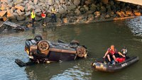 Va. first responders rescue 2 after SUV crashes into river
