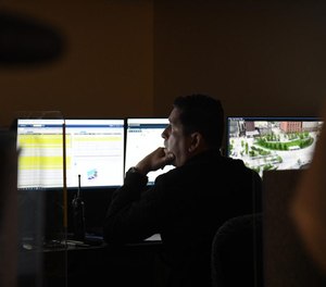 A member of Cleveland’s Real Time Crime Center oversees an active incident, preparing first responders with intel, as evidence is analyzed live and relayed to the scene.