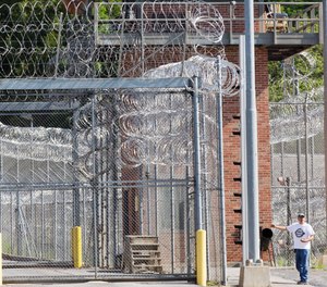 An employee leaves the Clinton Correctional Facility, Wednesday, June 17, 2015 in Dannemora, N.Y.