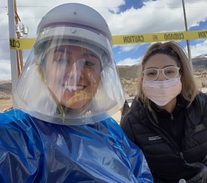 Community Behavioral Health Navigators Coco Andrade (left) and Gladys Villa, of Eagle County Paramedic Services, began helping with COVID-19 testing just a week after they joined the service, and are now preparing to manage the ripple effects of the pandemic on the mental health needs of their community. (Photo/Eagle County Paramedic Services)
