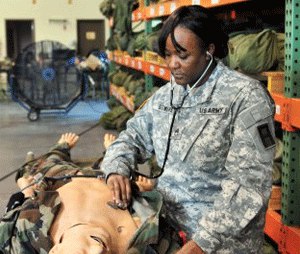 Staff Sgt. Eyamba Sowers, a combat medic with the 188th Infantry Brigade, First Army Division East, listens to the simulated heartbeat of the Laerdal SimMan patient simulator during a four-day familiarization course held in September at the Regional Training Site-Medical, Fort Gordon, Ga.