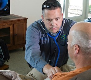 Reduce distractions during the patient assessment by politely asking for the television to be turned off or turned down, and for bystanders to step back and give you more space.