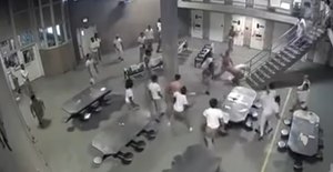 A fight breaks out between inmates at Cook County Jail in Chicago.