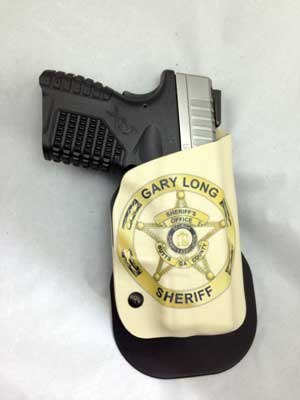 Bob Cook has developed a unique process where he can mold your weapon-specific Kydex holster with your full color badge, shield, or star infused right into the front of the holster.