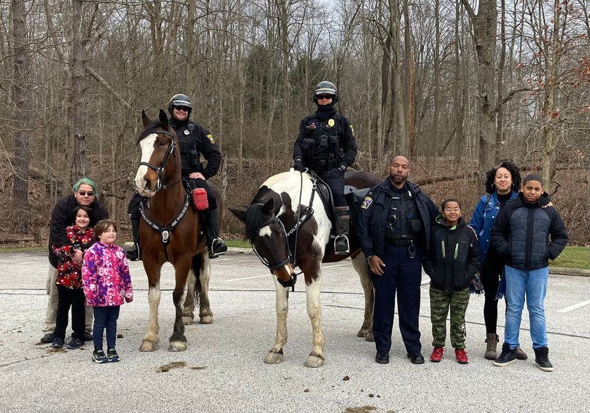 Cop Scouts program participants meet RHPD's mounted patrol officers.