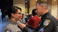 Calif. police recruit pinned by officer who saved her life 22 years ago
