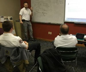 Dr. Naccarato working through an interesting case study with Cowley College paramedic students